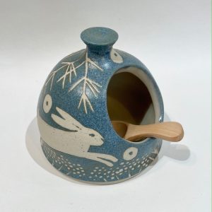 Blue stoneware salt pig, hare design