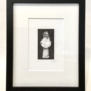 Framed, limited edition print of a wren sitting on a thimble