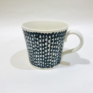 Beautiful porcelain mug, with line and dot design