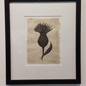 Framed lino cut print of a Thistle