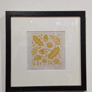 Framed lino cut print of an Autumn design (mustard)